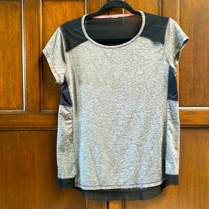 Gray and black sheer athletic jersey top